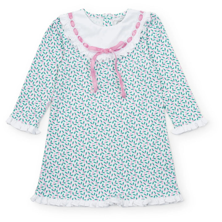 Children's nightgown with green holly pattern and pink trim on a white background
