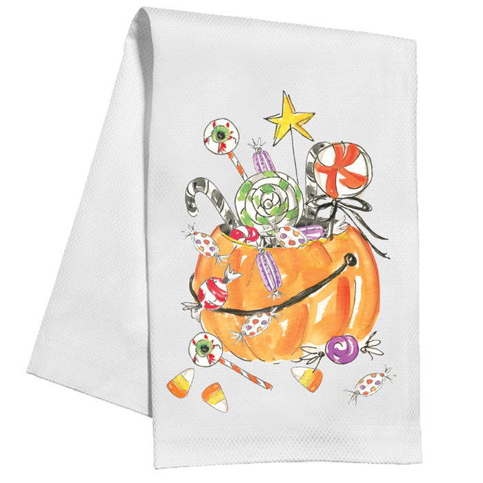 Decorative towel with a colorful pumpkin filled with candies design on a white background