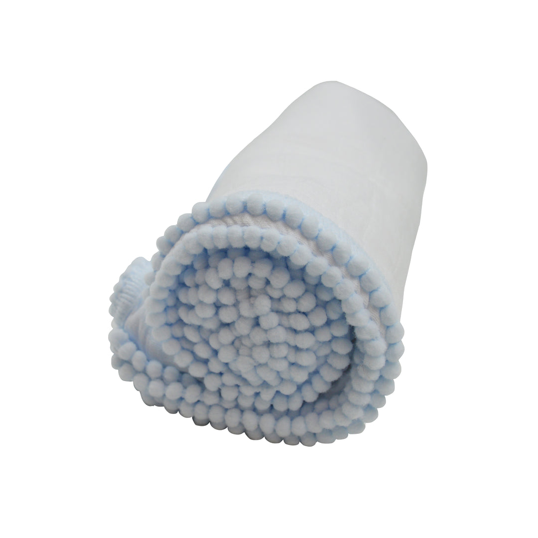 Roll of white fabric with blue trim on a white background