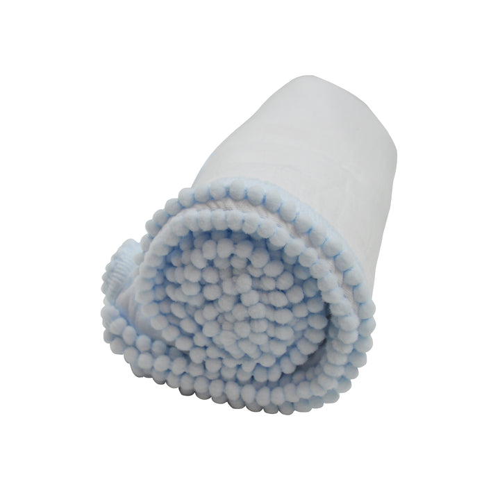 Roll of white fabric with blue trim on a white background