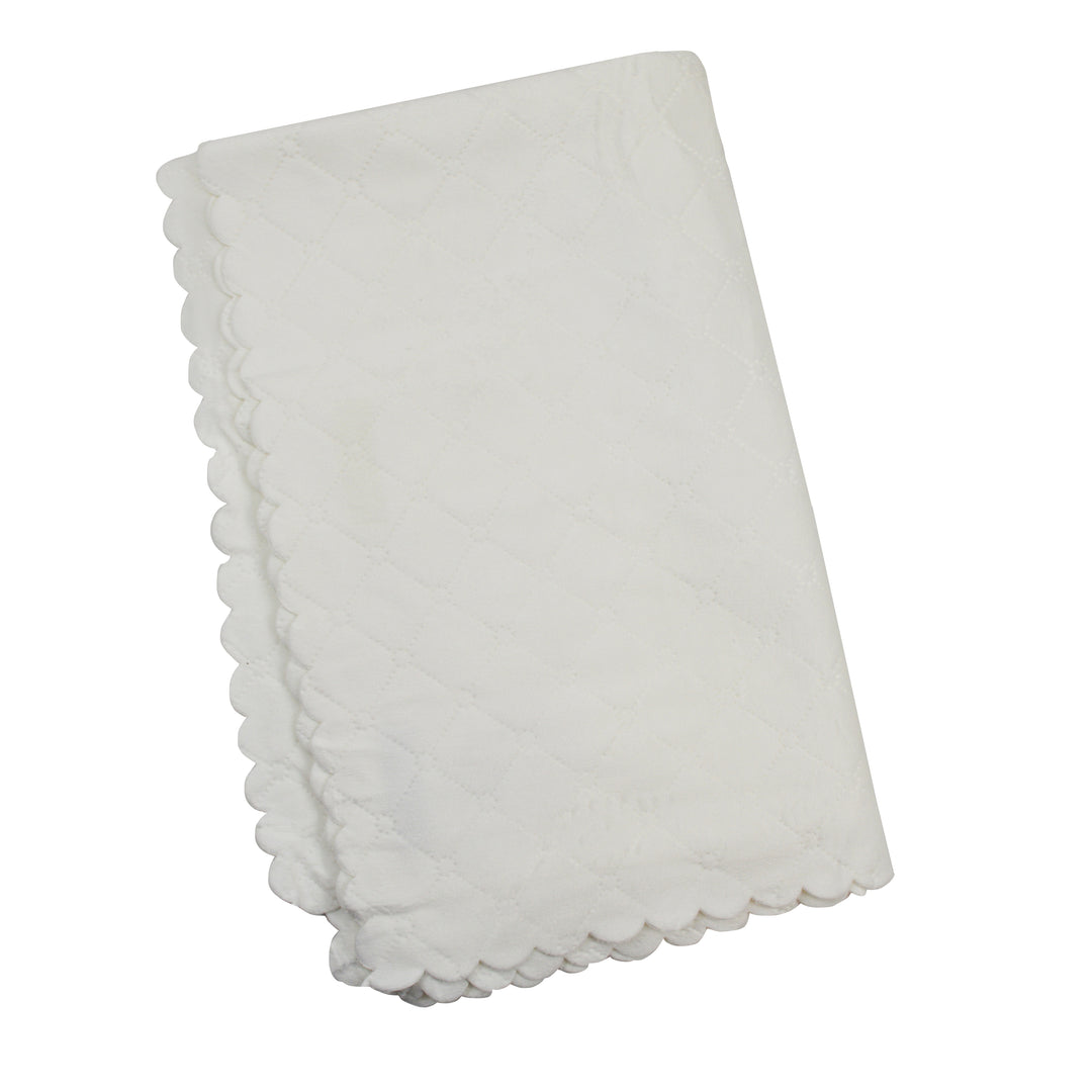 quilted ivory blanket