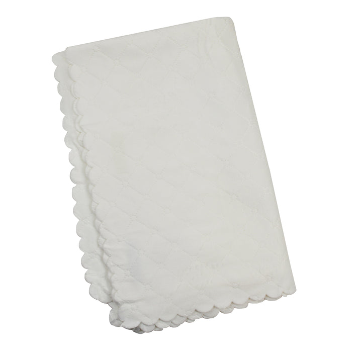 quilted ivory blanket