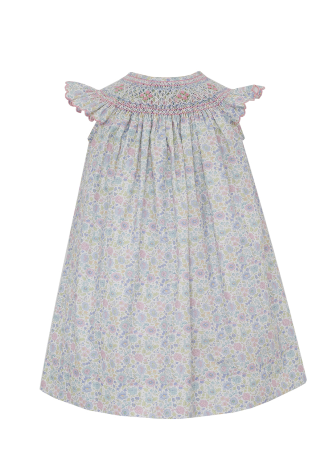 Floral dress with smocked neckline on a white background