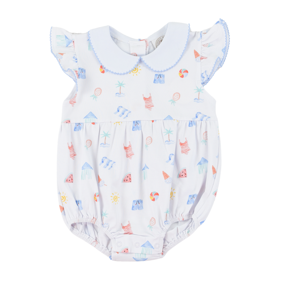 Baby romper with colorful beach print on a white background