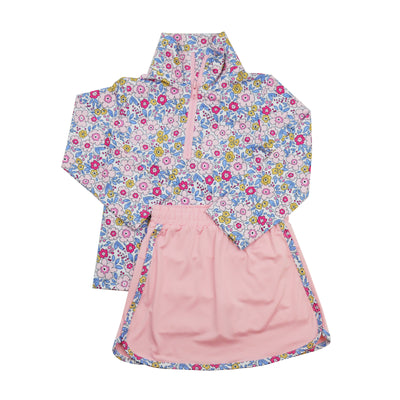 Floral-patterned jacket with matching pink skort on a white background