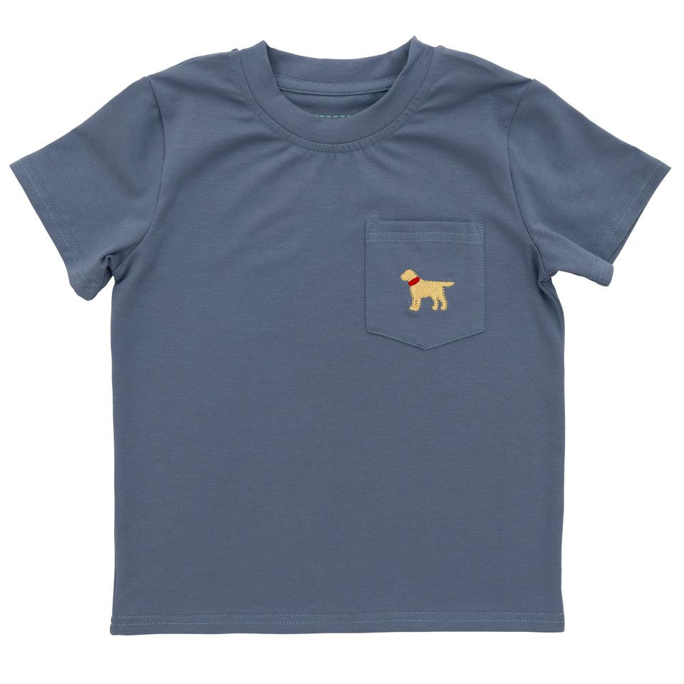 Blue t-shirt with a small pocket featuring a yellow dog illustration on a white background