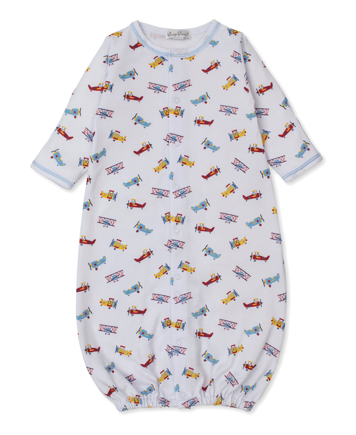 Baby onesie with airplane pattern on a white background