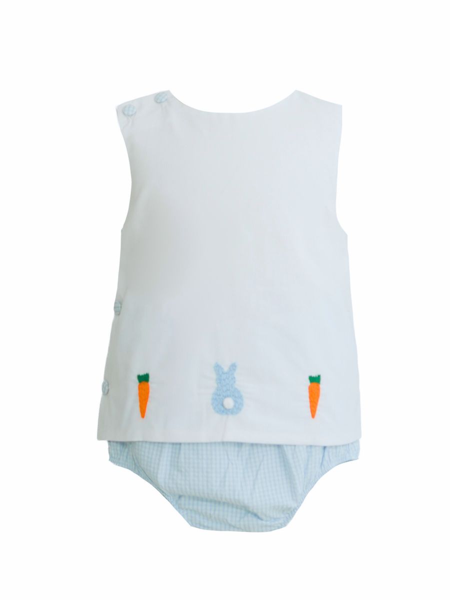 Baby outfit with sleeveless top and shorts on a white background