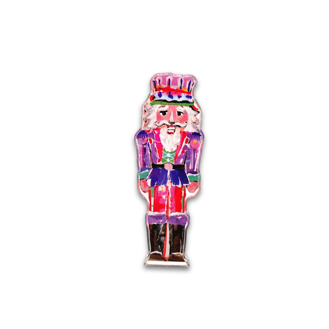 Colorful nutcracker toy on a white background