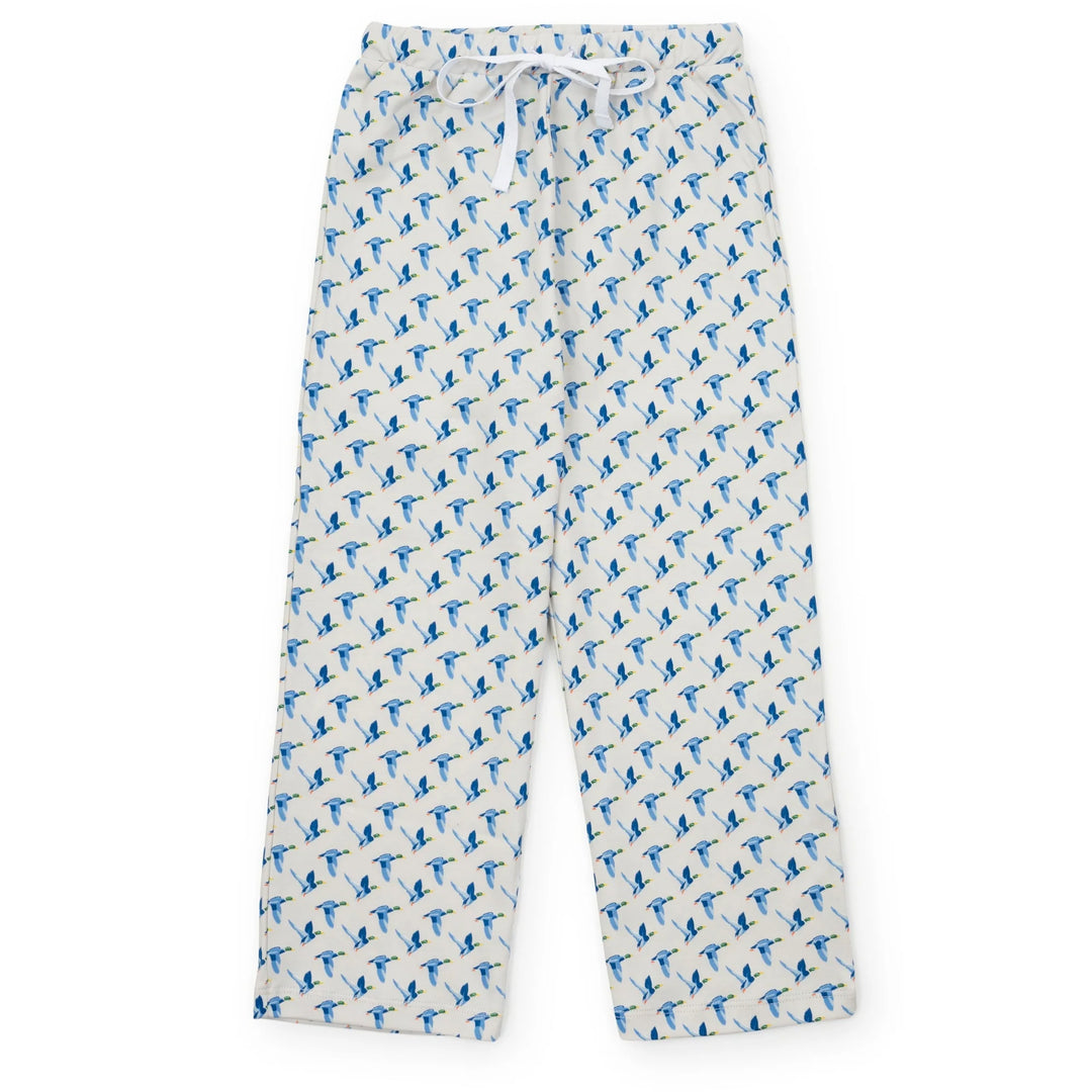 White pajama pants with blue duck
 pattern on a white background
