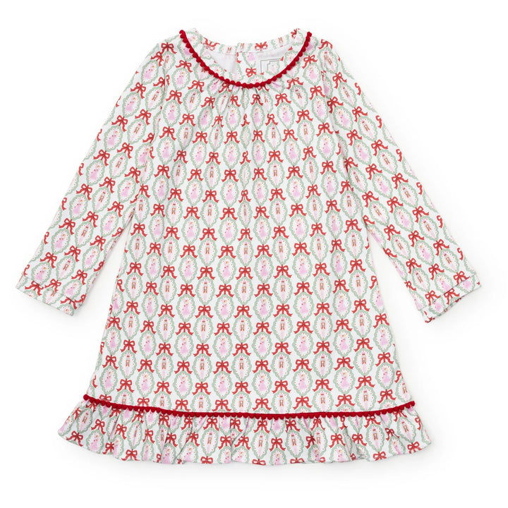 Children's nightgown with red and pink bow pattern on a white background