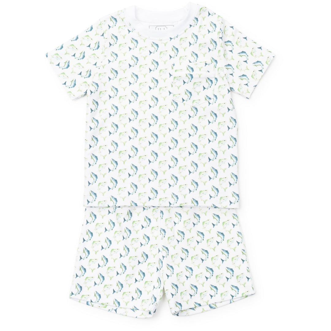 Children's outfit with a pattern of small blue and green trout fish on a white background