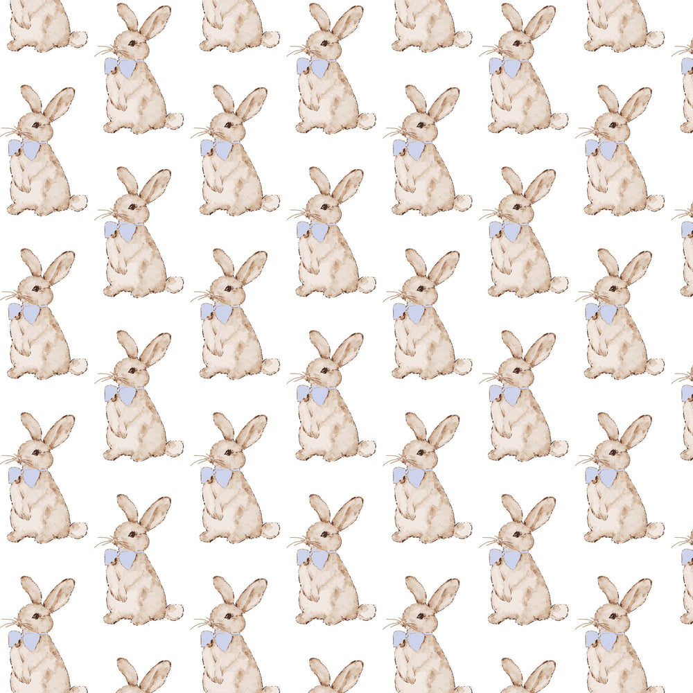 Pattern of beige bunnies with blue bow ties on a white background