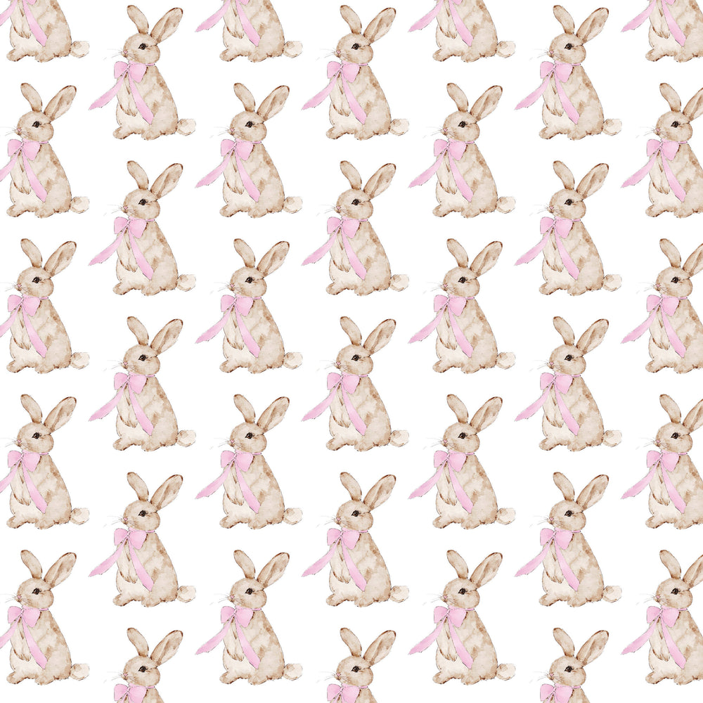 Pattern of rabbits with pink bows on a white background