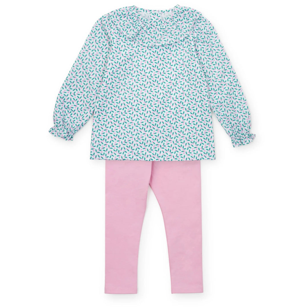 Children's outfit with a patterned top and pink pants on a white background