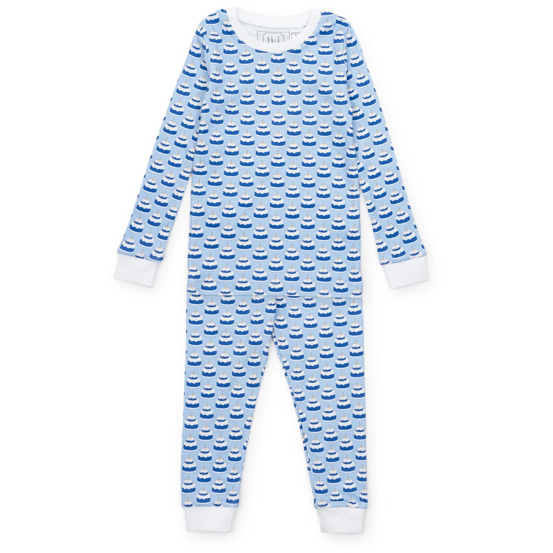Blue and white birthday cake patterned pajama set on a white background