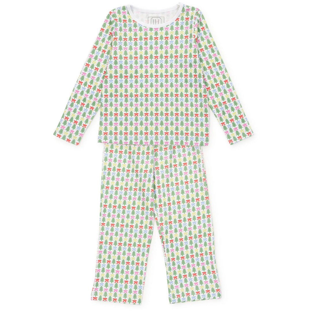 A two-piece long-sleeve pajama set featuring a repeating pattern of green pine trees with red bows on a white background, laid flat against a white backdrop.