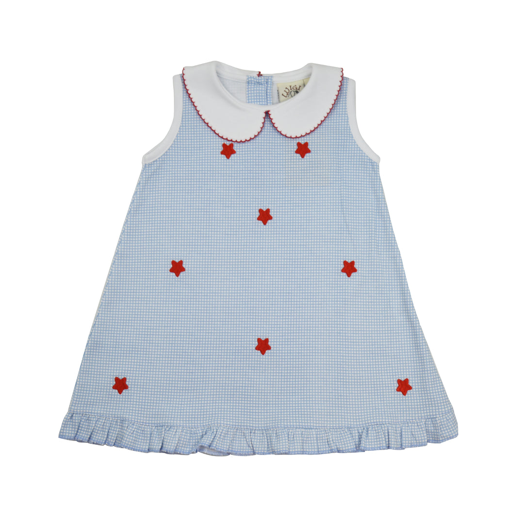 Children's dress with red star patterns on a white background
