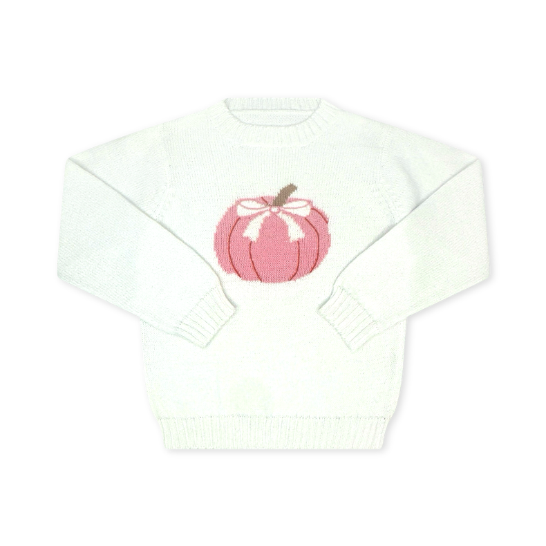 White sweater with a pink pumpkin design on a white background