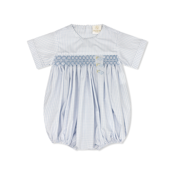 Baby romper with blue and white check pattern on a white background
