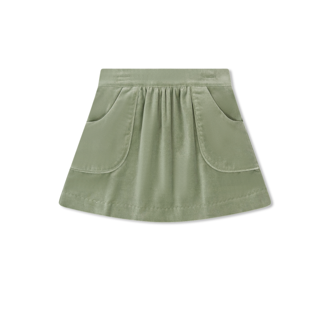Green skirt with two front pockets on a white background
