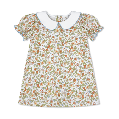Floral dress with a white collar on a white background