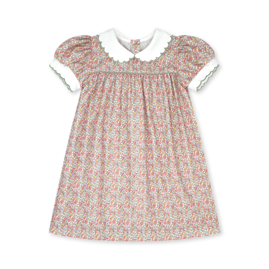 Floral dress with white collar on a white background