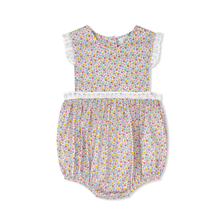 Baby romper with floral pattern on a white background