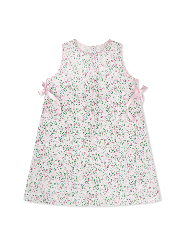 Floral dress with pink bows on a white background