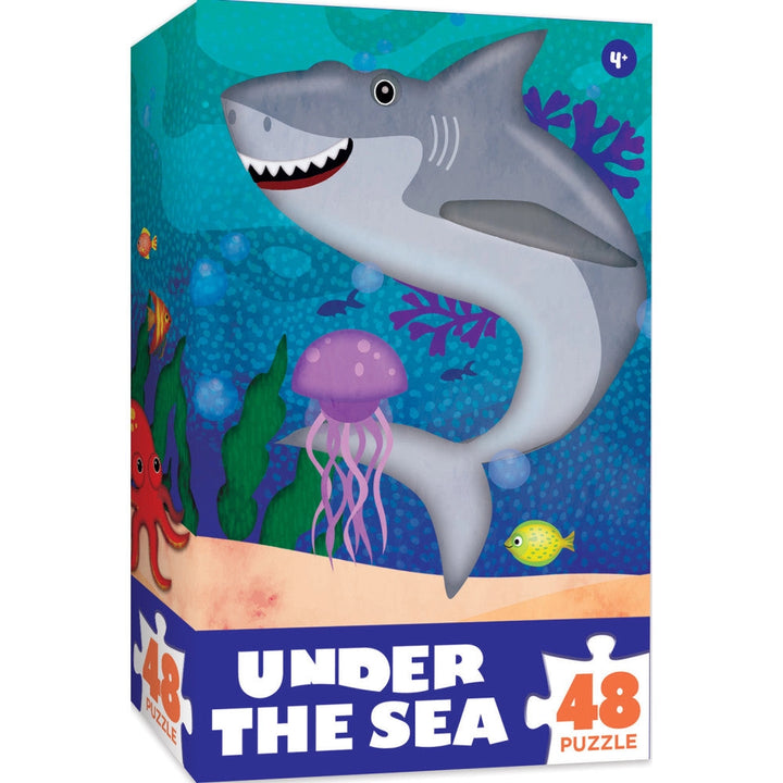 Puzzle box with a shark and sea creatures on a blue underwater background