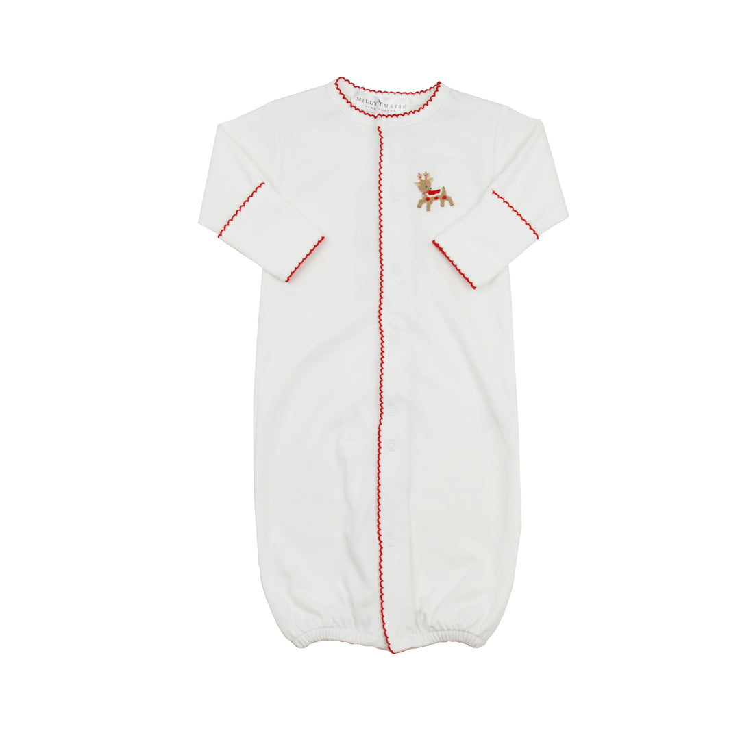 White baby gown with red stitching and a small embroidered reindeer design on a white background
