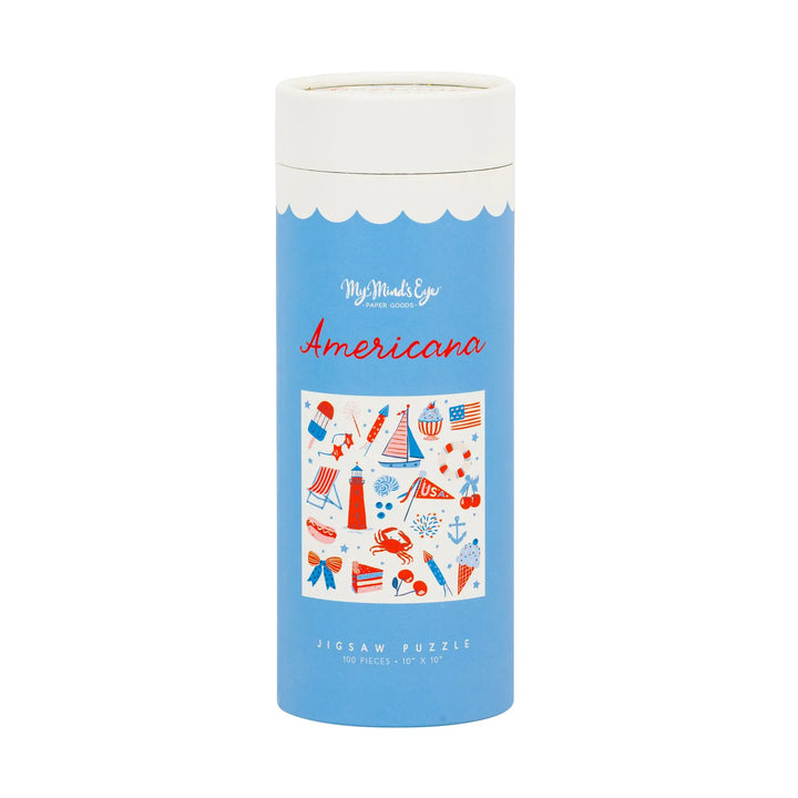  cylindrical puzzle box with blue label and white lid on a white background