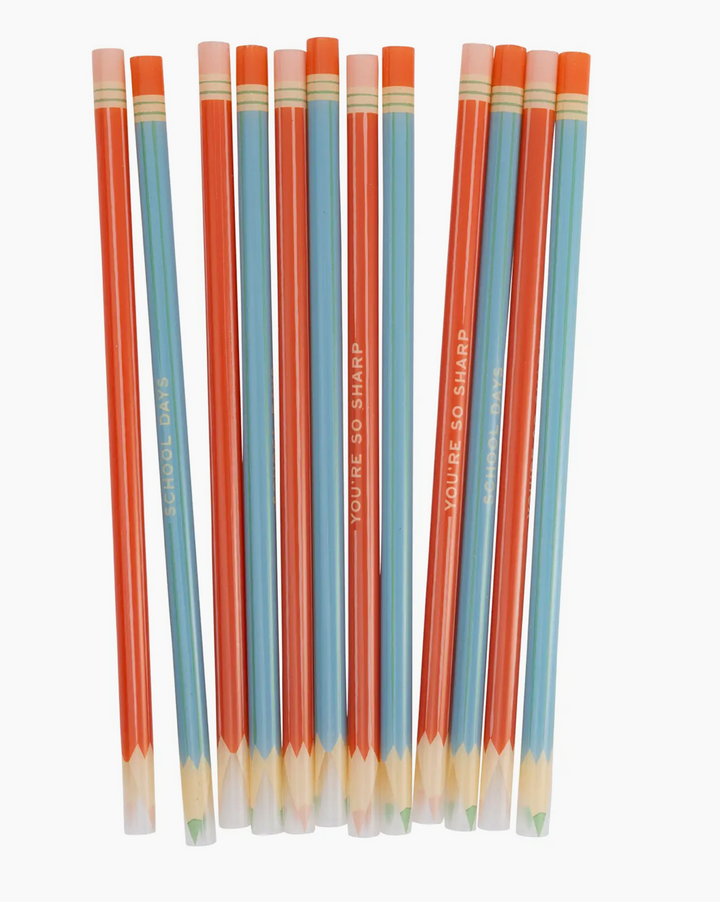 Set of colored pencils with red and blue stripes on a white background