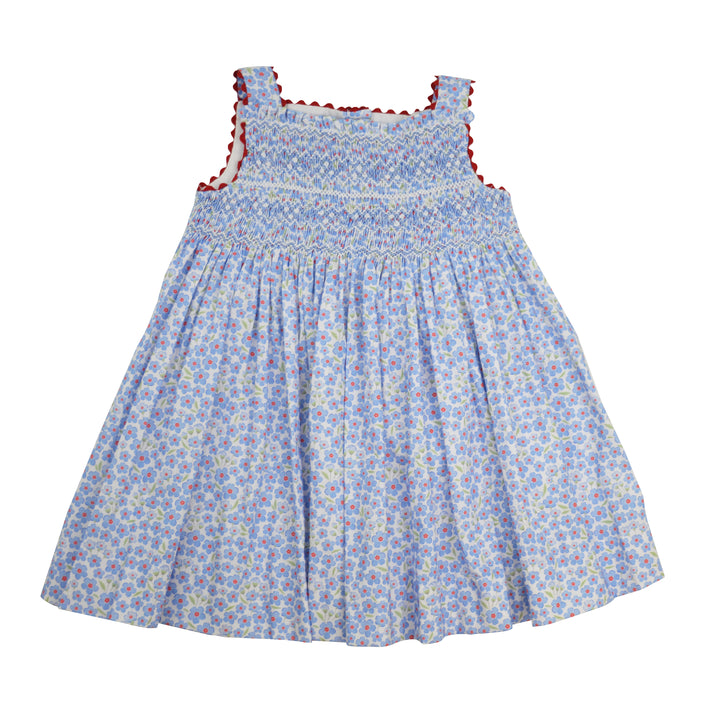 Floral dress with red trim on a white background