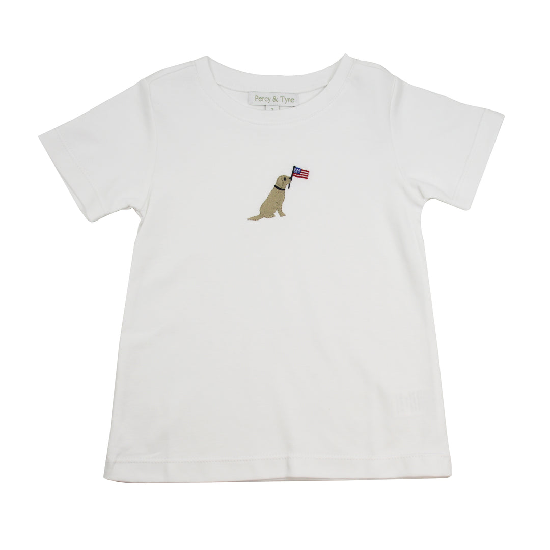 White t-shirt with a dog holding an American flag design on a white background