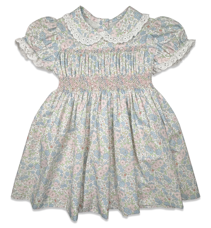 Floral dress with lace collar on a white background