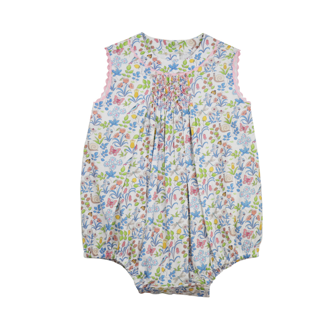 Floral-patterned baby romper on a white background