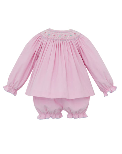 Pink bloomer set with smocked top and bloomers on a white background