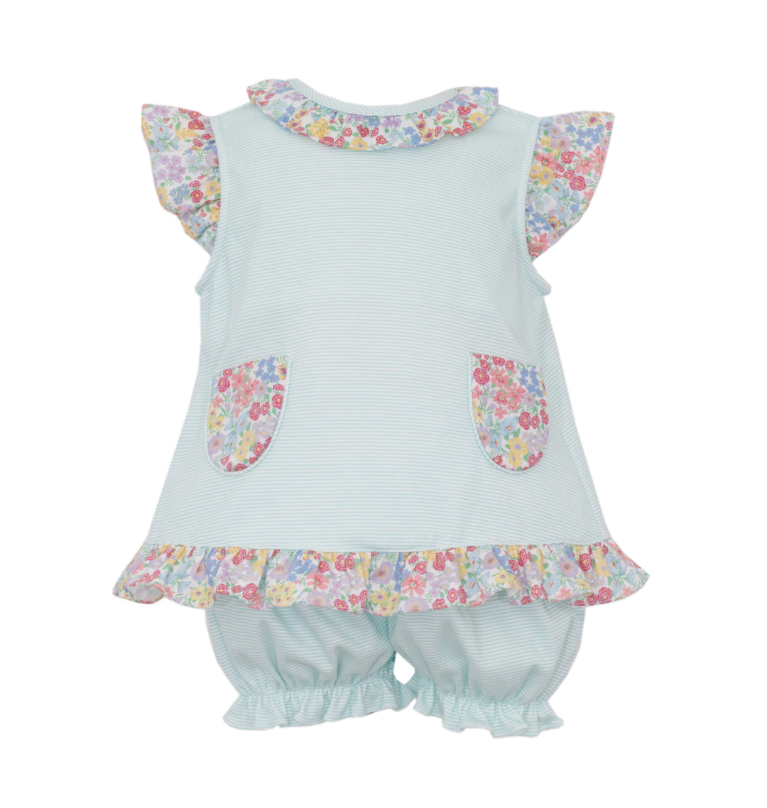 Children's outfit with floral top and bloomers on a white background