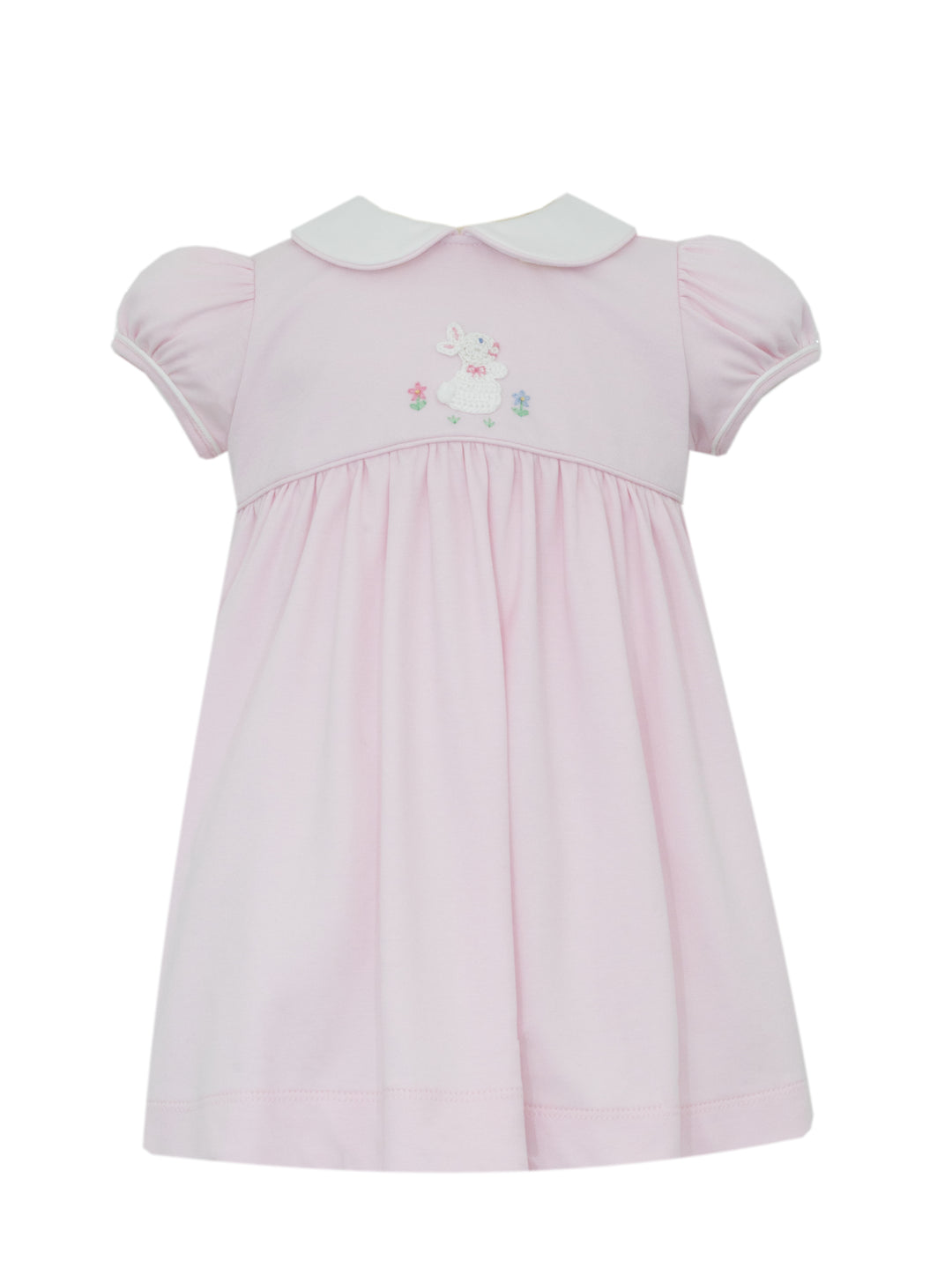 Pink dress with white collar on a white background