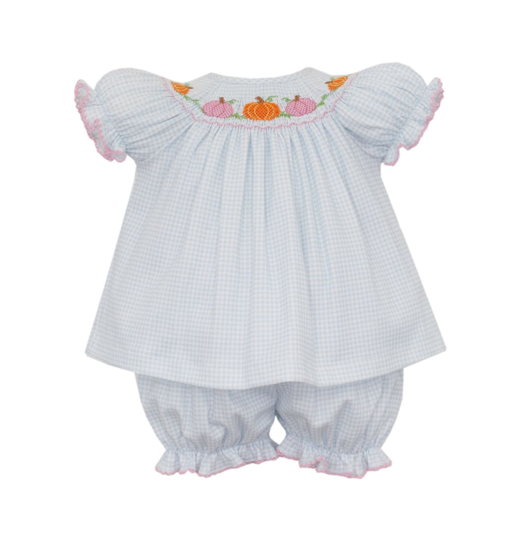 Baby outfit with checkered top and bloomers on a white background