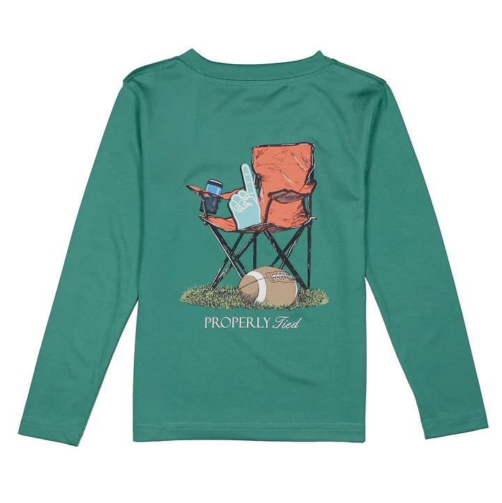 Green long-sleeve shirt with a graphic of a chair, cooler, and football on a white background