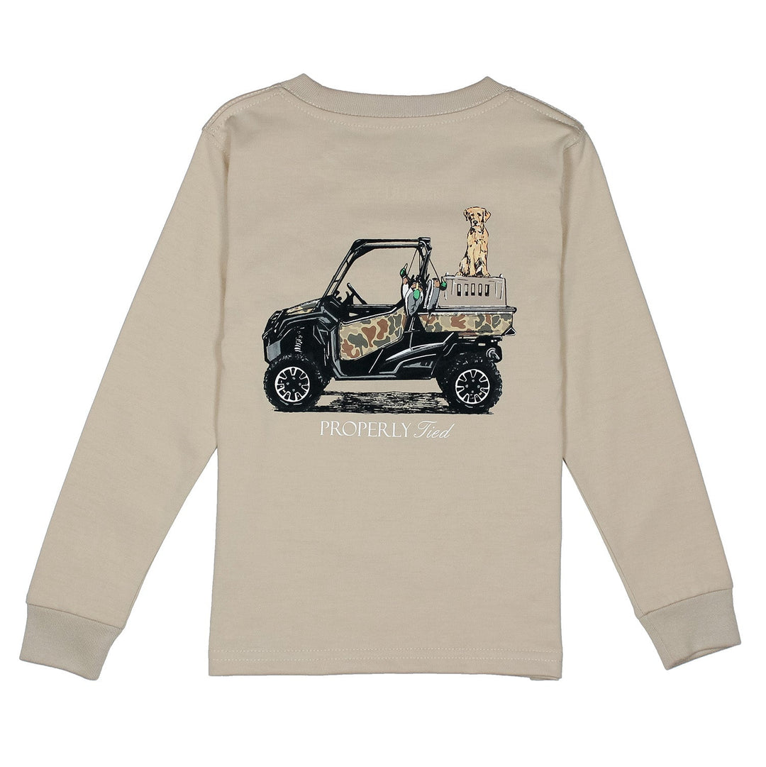 Beige long-sleeve shirt with a graphic of a UTV and dogs on the back, on a white background.