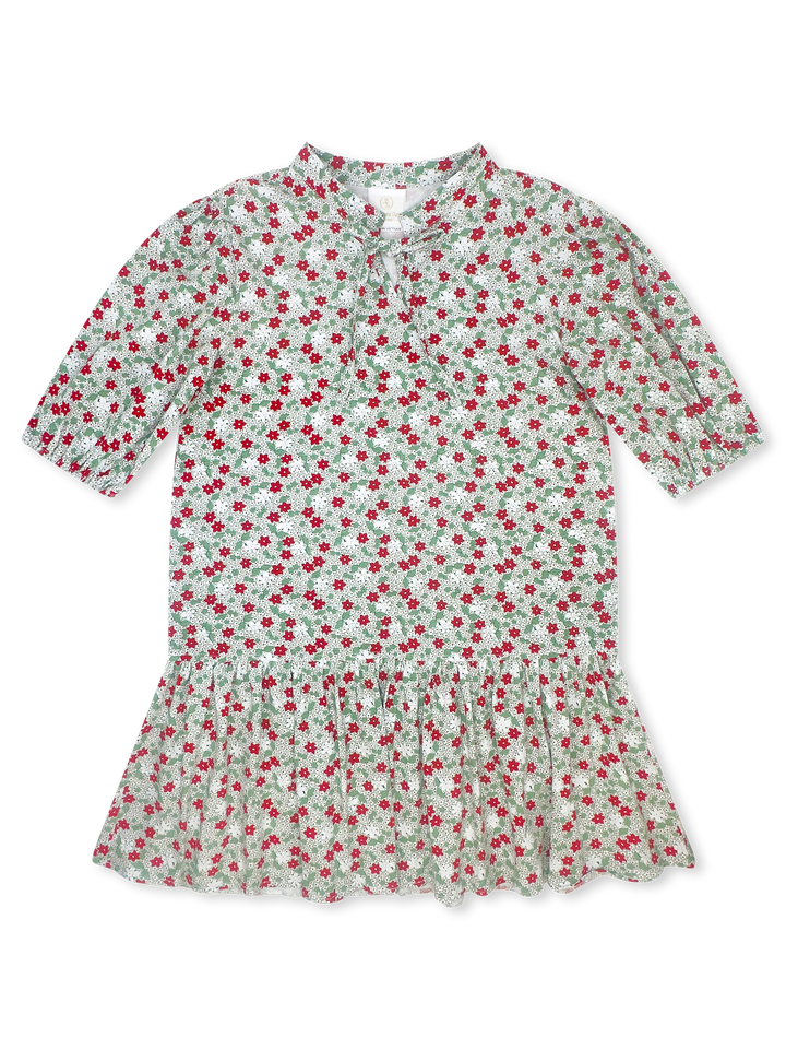 A short-sleeve collared dress with an all-over cherry print on a light sage green background, featuring a ruffled hem and a button-up front.