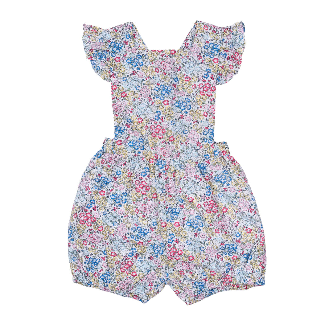 Floral-patterned romper on a white background