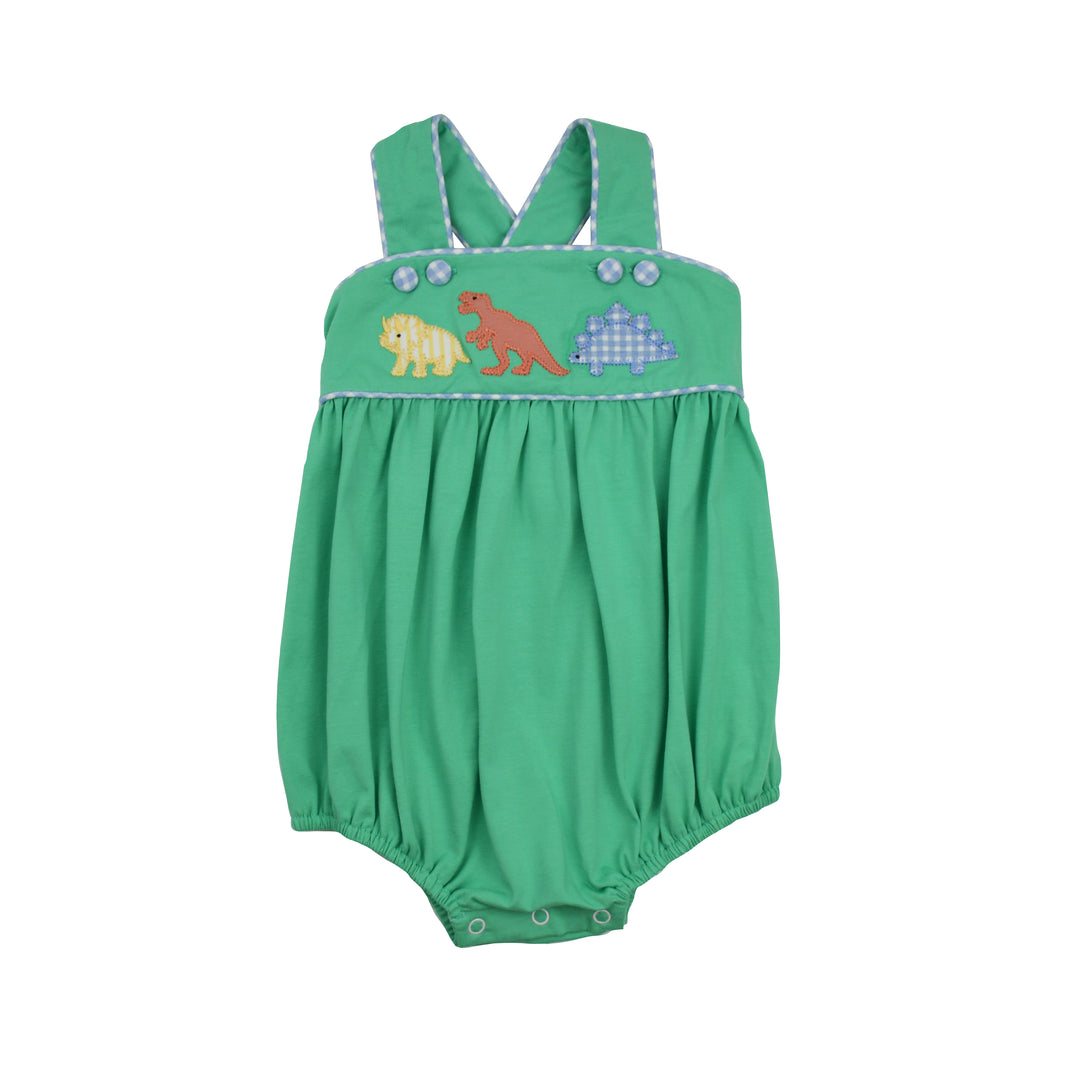 Green baby romper with dinosaur designs on a white background