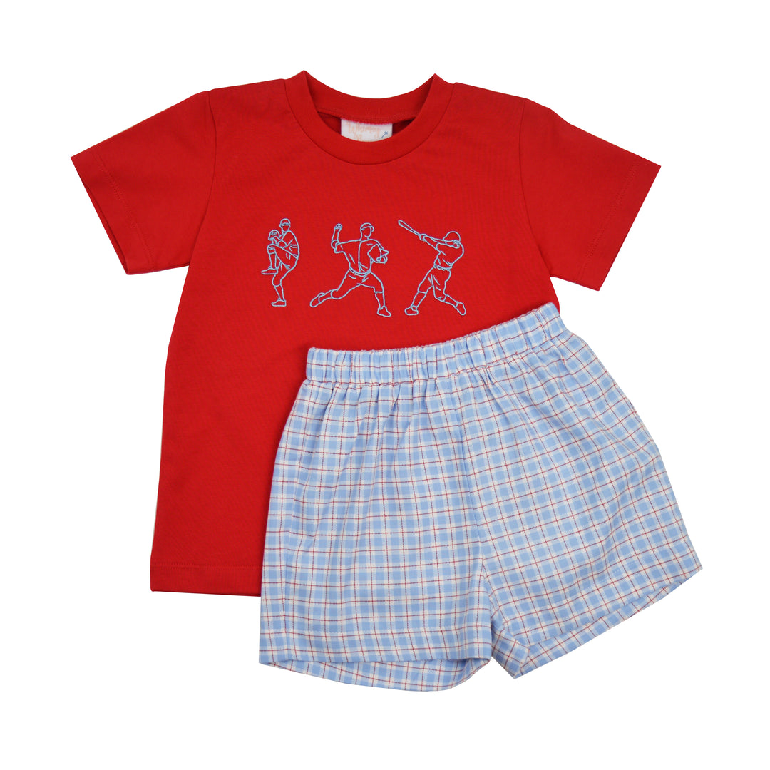 Red t-shirt with graphic design and blue checkered shorts on a white background