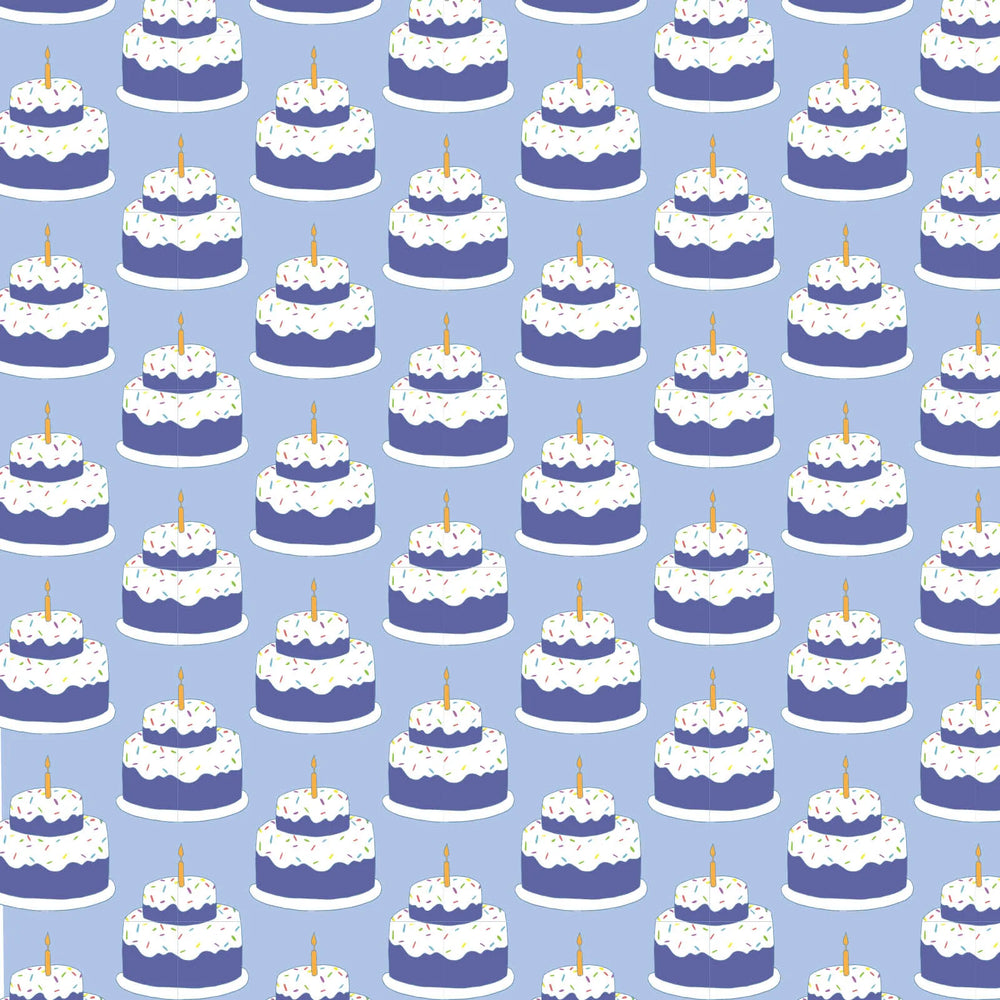 Pattern of blue and white cakes with candles on a blue background