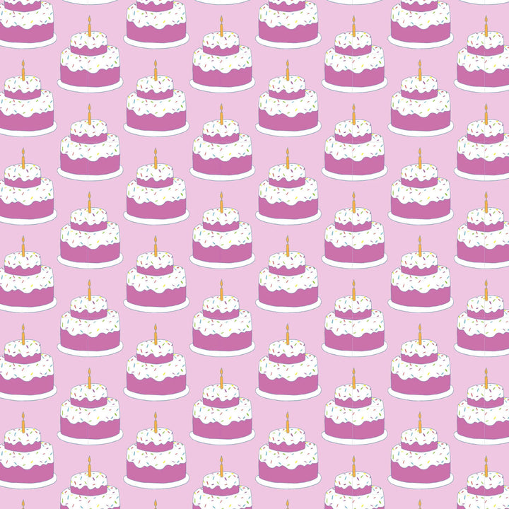 Pattern of pink cakes with white frosting and candles on a pink background