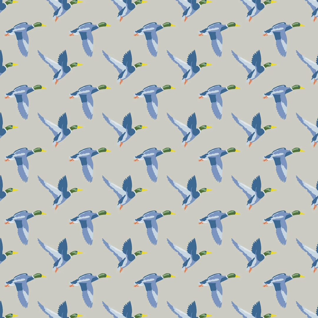 Pattern of blue ducks with green heads on a gray background